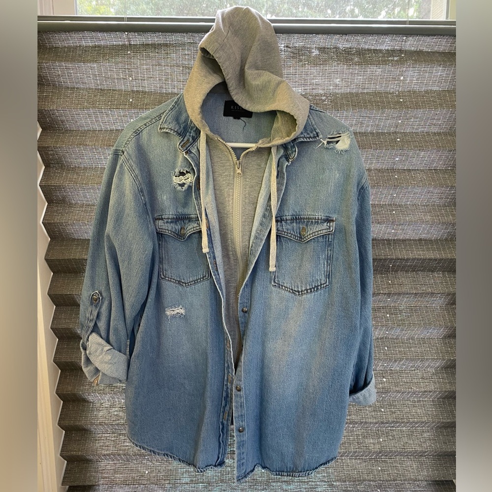 Hooded distressed denim jacket with rolled sleeves
